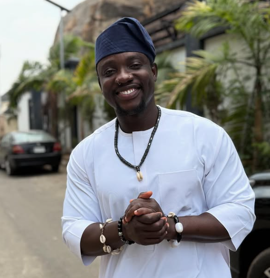 Very Dark Man smiling