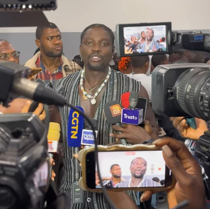 Very Dark Man in a conversation